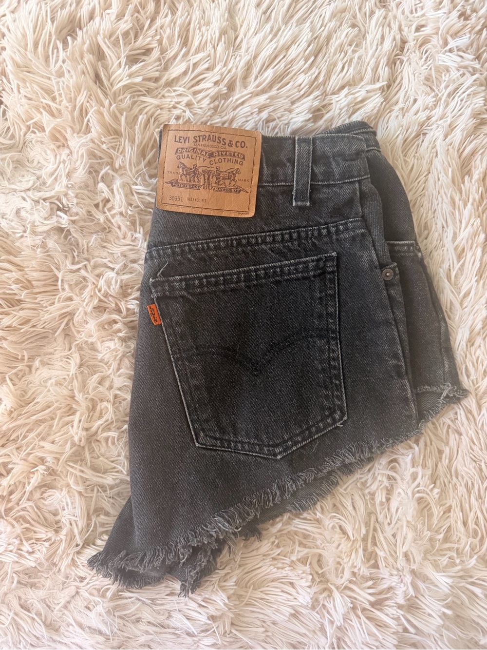 Levi's Faded Black/Gray Denim Skirt with Frayed Edge